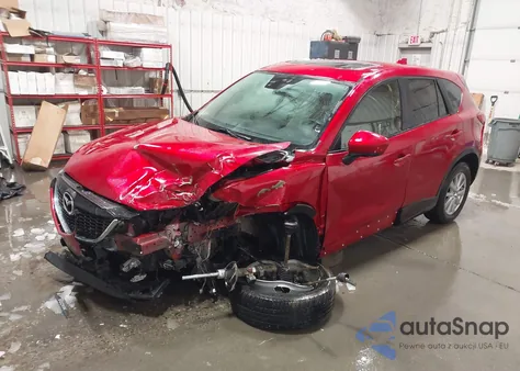 2014 Mazda Cx-5 Touring z USA, uszkodzony, nr VIN JM3KE4CY6E0418712